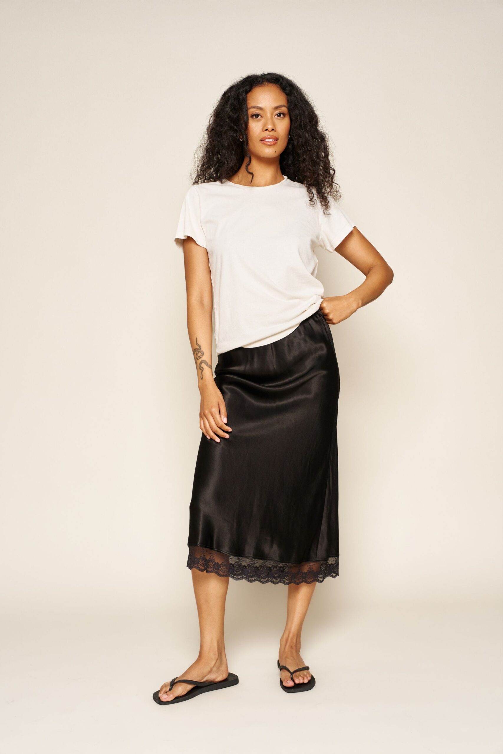 Donna-Skirt-in-Silky-Black-with-lace-whimsy-and-row.jpg